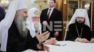 Porfirije sa Putinom i Kirilom